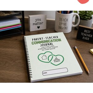 May include: A spiral-bound "Parent-Teacher Communication Journal" with green text and graphics. The journal includes space for a name and is designed to manage daily student behaviors. Other items include a mug, a sign that says "Best Teacher Ever", and a pencil.