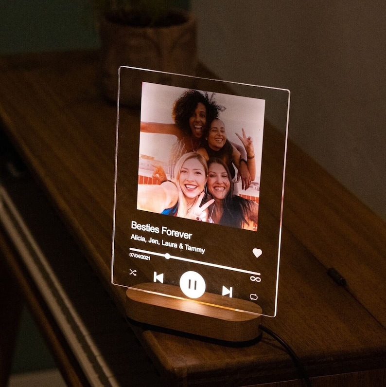 May include: A clear acrylic photo frame with a lit-up music player design. The frame displays a photo of four friends and the text "Besties Forever Alicia, Jen, Laura & Tammy 07/04/2021".