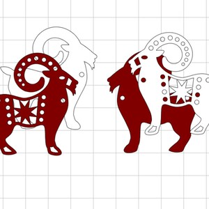 May include: Two red paper cutouts of a goat with intricate designs. The goat on the left has a star design on its body and the goat on the right has a circle design on its body.