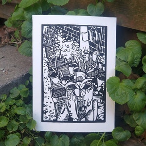 Potting Out: handprinted lino print, unframed.