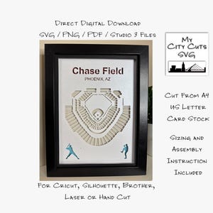 May include: A framed paper cut art piece of Chase Field in Phoenix, AZ. The stadium is depicted in white, with two blue baseball players. The frame is black, and the text "Chase Field" is visible. The art is a direct digital download.