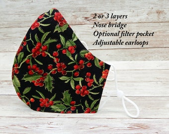 Mascarilla navideña de acebo: mascarilla navideña de algodón con bolsillo para filtro