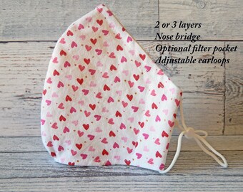 Mascarilla facial con estampado de corazón: tela de algodón, ajustable, con bolsillo para filtro