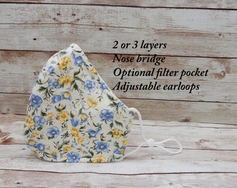 Mascarilla facial con estampado floral azul Mascarilla facial con estampado floral amarillo Mascarilla facial de verano Mascarilla facial de primavera con bolsillo para filtro en el puente nasal y orejeras ajustables
