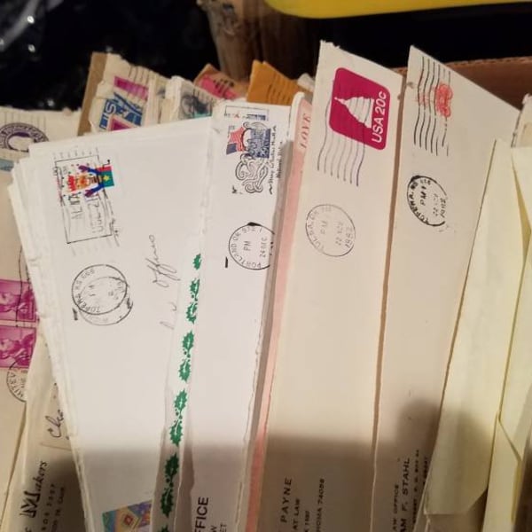 One pound of assorted, old envelopes, with cancelled stamps. Dated from. 1970s through the 1990s. Ephemera. Cancelled stamps.