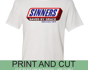 May include: White t-shirt with a blue and red graphic of a candy bar with the text "SINNERS SAVED BY GRACE Ephesians 2:8-9". The text "PRINT AND CUT CUT FILES FROM DIGITAL LIFE GURU" is at the bottom of the image.