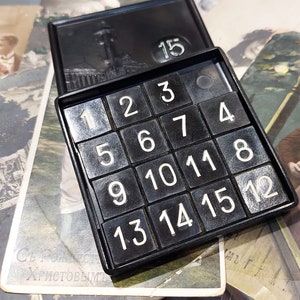 Vintage puzzle game, game 15, game logic