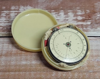 vintage round slide rule 1960s calculator pocket calculator mathematica lnstrument math round logarithmic rule