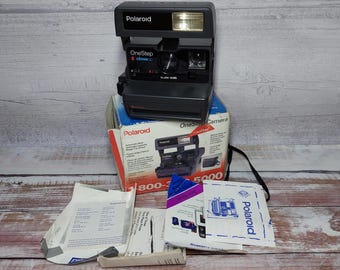Polaroid vintage de cerca, cámara Polaroid, cámara vintage, cámara retro, cámara de fotos retro, Polaroid