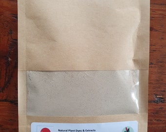 May include: A brown paper bag with a clear window showing a beige powder inside. The bag has a label that says "Natural Plant Dyes & Extracts Gallnut" and includes instructions for use and warnings. The label also includes the text "50g" and "Contact us: www.wonkwweaver.com".