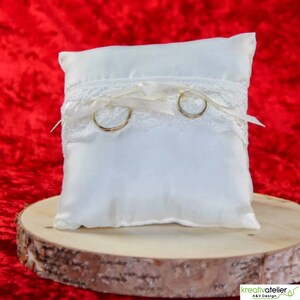 Champagne colored taffeta ring pillow with bobbin lace and satin ribbons - romantic highlight for your wedding ceremony