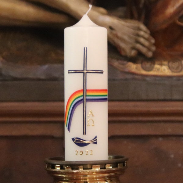 hand-decorated festive Easter candle in ivory, religious with cross, rainbow, fish, alpha and omega, Easter gift, Easter decoration