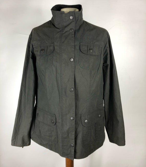 Giacca Barbour corta nero Flyweight Wax jacket UK