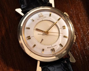 Vintage Jaeger-LeCoultre Memovox alarmhorloge, tweekleurige wijzerplaat, zeldzame kast, kaliber 814 uit de jaren 1950.