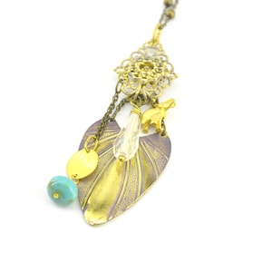 Jasmine necklace with animal and stone charm