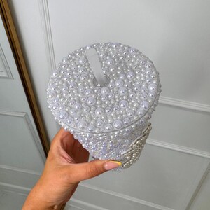 WOW! The ultimate cool-girl hen party accessory is here! Get hen party ready and prepare to sparkle with our dazzling BRIDE pearl stanley cup! Featuring a twist top, straw, pearl detailing and silver diamante bride text, this personalised cup is definitely one to make the bride stand out!