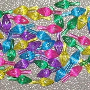 May include: Assortment of colorful Christmas light bulbs in various shades of green, blue, purple, pink, and yellow. The bulbs are shaped like a teardrop and have a shiny, iridescent finish.