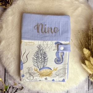 Personalized health book protector with the first name of the child or baby in cotton gauze and cotton printed with children's patterns, marine jungle animals image 1
