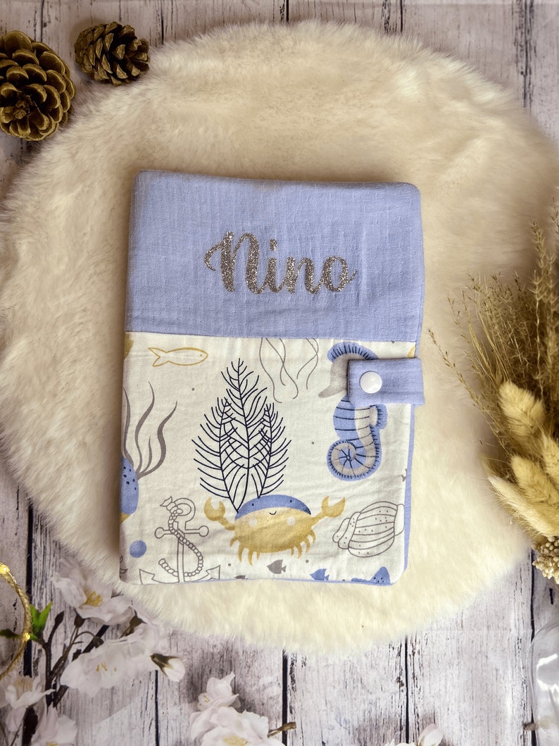 Personalized health book protector with the first name of the child or baby in cotton gauze and cotton printed with children's patterns, marine jungle animals image 1