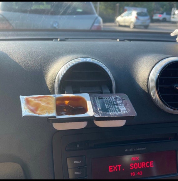 Car sauce holder maccas = McDonald's : r/ofcoursethatsathing