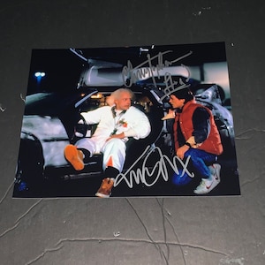 Michael J Fox en Christopher Lloyd ondertekenden Back to the Future Marty McFly Emmett Brown Dolorean 8 x 10 foto