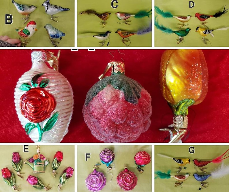May include: Assortment of glass Christmas ornaments featuring a variety of designs, including birds, roses, and a raspberry. The ornaments are all hand-painted and have a vintage look.