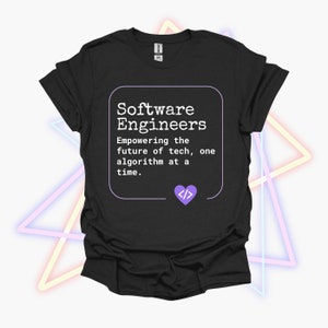 May include: Black t-shirt with a white square graphic that says "Software Engineers Empowering the future of tech, one algorithm at a time."  A purple heart with code symbols is below the text.