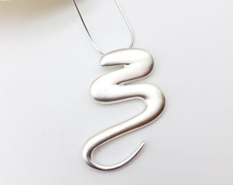 Jin Swirl Pendant Necklace - Silver Plated