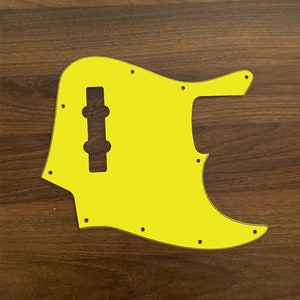 Solid Color Jazz Bass, graphic printed custom pickguard. Big Bird Yellow