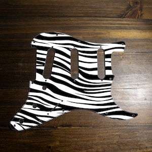 Strat/tele pickguard Wild Zebra