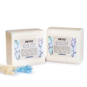 May include: Two white bars of goat's milk melt and pour soap base. The soap base is labeled "PIFITO™ Goat's Milk Melt & Pour Soap Base".