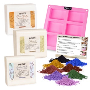 May include: A collection of soap-making supplies, including three white soap bases labeled "Shea Butter", "Oatmeal", and "Goat's Milk". A pink silicone mold, instructions, and colorful soap dye powders are also shown.