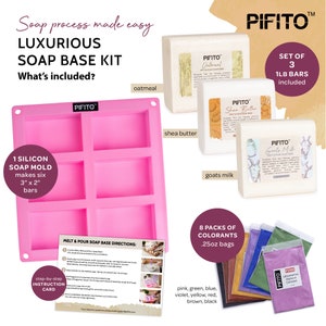 May include: A pink silicone soap mold with six rectangular cavities, each 3" x 2", alongside three 1 lb soap bars labeled "Oatmeal", "Shea Butter", and "Goats Milk". Includes 8 colorant packs and an instruction card.