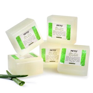 May include: Four clear, rectangular bars of melt and pour soap base with a green and white label that reads "PIFITO Aloe Vera Melt & Pour Soap Base". The label features a green aloe vera plant illustration. The soap bars are stacked on a white surface.