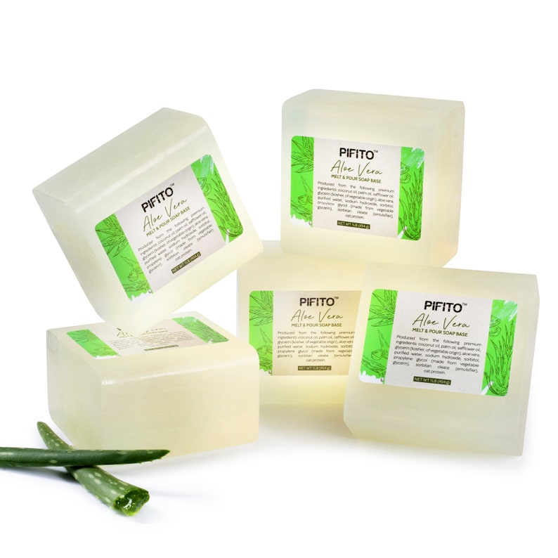 May include: Four clear, rectangular bars of melt and pour soap base with a green and white label that reads "PIFITO Aloe Vera Melt & Pour Soap Base". The label features a green aloe vera plant illustration. The soap bars are stacked on a white surface.