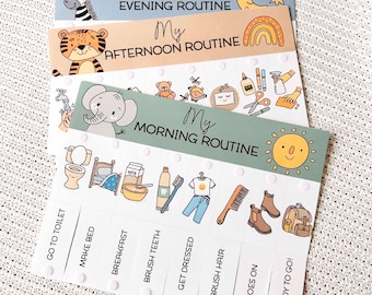 May include: A colorful routine flip chart for children, featuring illustrations and text for morning, afternoon, and evening activities. The chart includes images of a zebra, tiger, and elephant, with a sun, moon, and rainbow. The bottom of the chart has a list of activities.