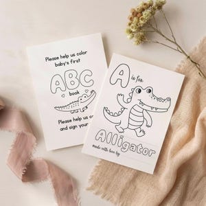 May include: Two white rectangular coloring cards with black line art. One card reads Please help us color baby's first ABC book. The other card features a cartoon alligator and the text A is for Alligator and made with love by.