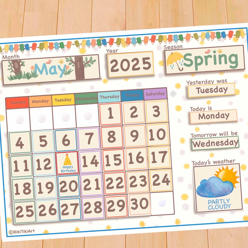 May include: A printable calendar for May 2025 with a spring theme. The calendar features a yellow background with white polka dots and a cartoon tree with a bird. The days of the week are listed at the top of the calendar, and the numbers for each day are in colorful boxes. The calendar also includes a section for the season, yesterday's date, today's date, tomorrow's date, and today's weather. The weather icon shows a partly cloudy sky with a sun.