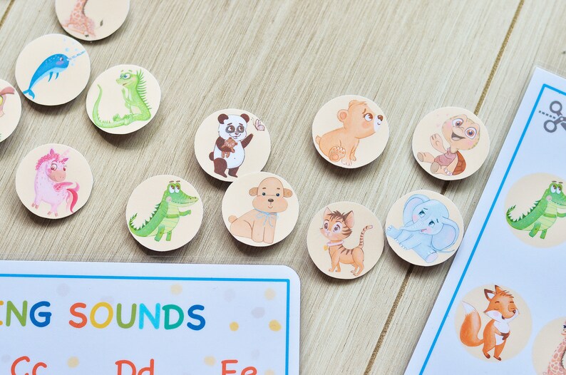 May include: A set of colorful, round, felt animal stickers with various animal illustrations. The stickers are designed for learning beginning sounds. The text on the card reads "Beginning Sounds".