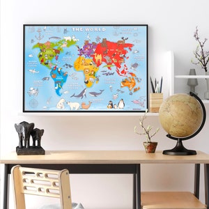 May include: A colorful world map with animals from different continents. The map is printed on a blue background with the title "The World" at the top. The map includes the names of the oceans and continents.