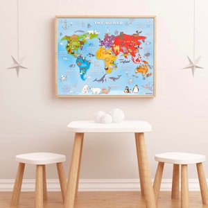 May include: A framed world map with a blue background and colorful continents. The map features animals from each continent, including a polar bear, a camel, a penguin, and a toucan. The map is titled "The World" and is hanging on a white wall above a white table and two white stools.