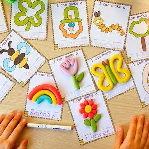 May include: A set of printable cards with colorful playdough creations and the words "I can make a" followed by the name of the object. The objects include a leprechaun, caterpillar, bee, rainbow, tulip, butterfly, flower, and tree.