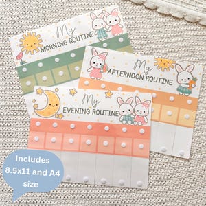 May include: Three colourful routine charts with the text "My Morning Routine", "My Afternoon Routine", and "My Evening Routine". Each chart features cartoon bunnies, suns, moons, and stars. The text "Includes 8.5x11 and A4 size" is also visible.