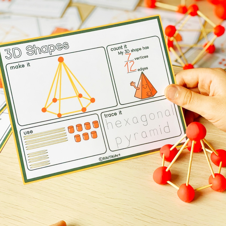 May include: A printable worksheet for learning about 3D shapes. The worksheet shows a hexagonal pyramid with instructions to count the vertices and edges, trace the shape, and make it using craft sticks and play dough.
