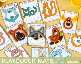 Op de afbeelding: Playdough-matten voor kinderen om bosdieren te maken. De kaarten tonen contouren van een beer, wasbeer, vogel, eekhoorn, uil, vos, stinkdier, konijn en eland. Elke kaart heeft de tekst "Ik kan een" en de naam van het dier.