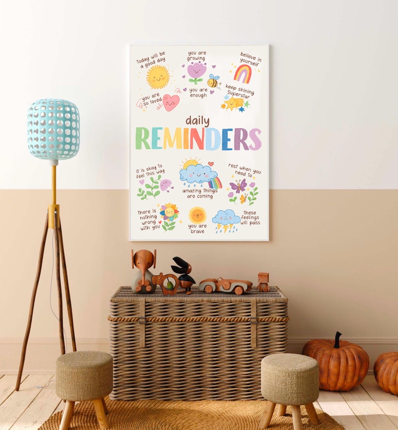 May include: A colorful poster with daily reminders for kids. The poster features illustrations of a sun, a flower, a rainbow, a cloud, a butterfly, and a heart. The text on the poster includes phrases like "Today will be a good day", "You are so loved", "You are growing", "You are enough", "Believe in yourself", "Keep shining Superstar", "It is okay to feel this way", "Amazing things are coming", "You are brave", "Rest when you need to", and "These feelings will pass".