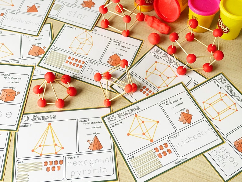 May include: A set of printable worksheets for learning about 3D shapes. The worksheets feature illustrations of different 3D shapes, such as a cube, pyramid, and octahedron. The worksheets also include instructions for making the shapes using craft sticks and playdough.