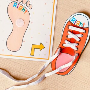 May include: A red and white shoe with white laces and the word "Right" written on it. The shoe is connected to a white string that leads to a white foot outline with the word "Right" written on it. The foot outline is on a white background with colorful dots.