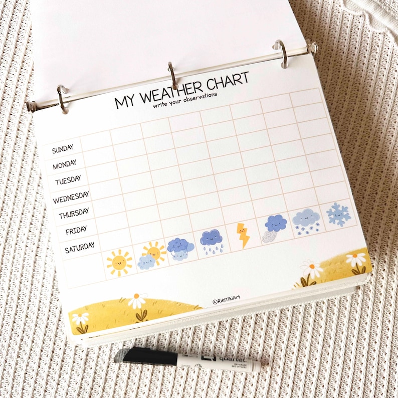 May include: A white weather chart notebook with a grid for daily observations. The title "MY WEATHER CHART" is at the top, with weather icons and a yellow floral border. A black marker pen rests below the notebook.