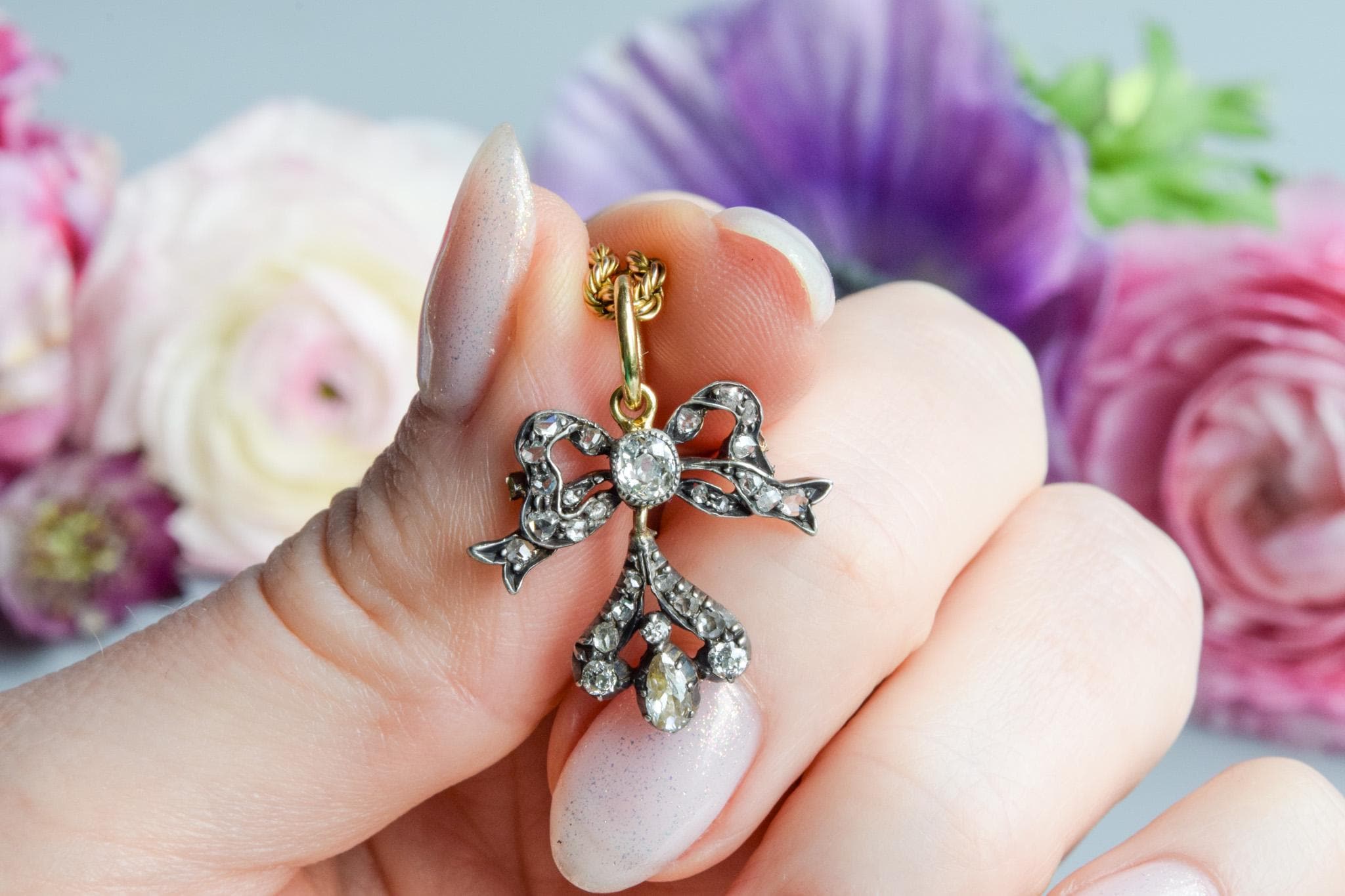 Antique early Victorian diamond set bow drop pendant 18 carat gold silver set
